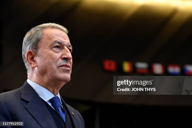 Turkish Defence minister Hulusi Akar looks on during a NATO defence ministers meeting, at the NATO headquarters in Brussels on October 24, 2019.