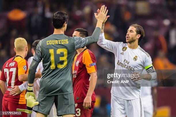 Goalkeeper Thibaut Courtois of Real Madrid CF, Sergio Ramos Garcia of Real Madrid CF during the UEFA Champions League group A match between...