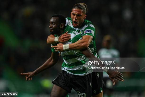 Yannick Bolasie of Sporting CP celebrates scoring Sporting CP goal with Pedro Mendes of Sporting CP during the UEFA Europa League group D match...