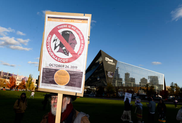 Protestors rally outside U.S. Bank Stadium before the game between the Washington Redskins and Minnesota Vikings on October 24, 2019 in Minneapolis,...