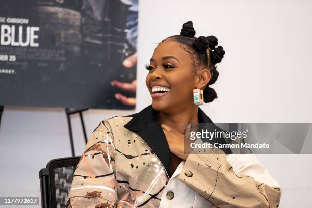 Nafessa Williams is seen during the "Black & Blue" cast members' visit to Morehouse College on October 24, 2019 in Atlanta, Georgia.