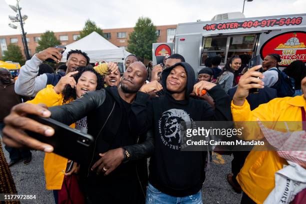 Tyrese Gibson takes a selfie with fans during the "Black & Blue" cast members' visit to Morehouse College on October 24, 2019 in Atlanta, Georgia.