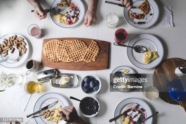 large spread of waffles and brunch - spread over stock pictures, royalty-free photos & images