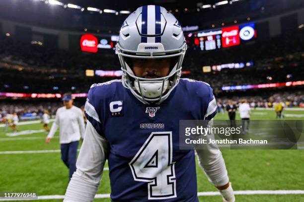 Dak Prescott of the Dallas Cowboys reacts after losing a game against the New Orleans Saints at the Mercedes Benz Superdome on September 29, 2019 in...