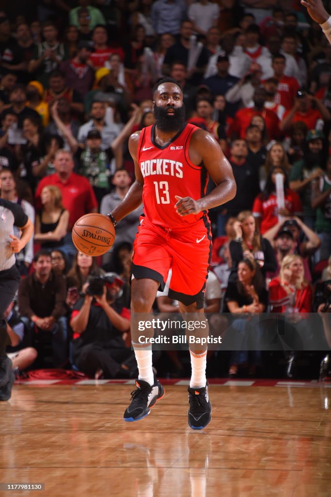 Harden Rockets James Harden of the Houston Rockets handles the ball against the ...