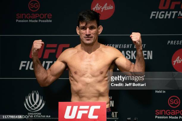 Demian Maia of Brazil poses on the scale during the UFC Fight Night weigh-in at the Mandarin Oriental on October 25, 2019 in Singapore, Singapore.