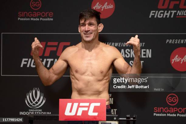 Demian Maia of Brazil poses on the scale during the UFC Fight Night weigh-in at the Mandarin Oriental on October 25, 2019 in Singapore, Singapore.