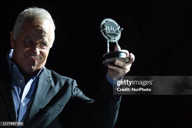 Greg LeMond , receives the UCI Presidents Trophy to celebrate the 30th anniversary of his historical UCI Road World Championships Tour de France...