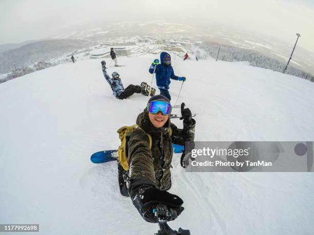 winter in niseko, japan. - niseko village ski resort stock pictures, royalty-free photos & images