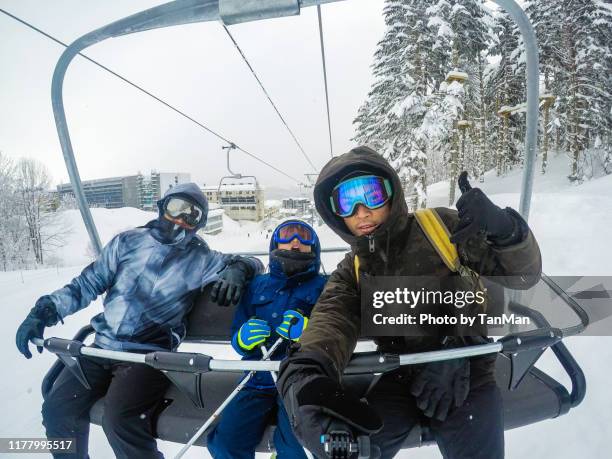 winter in niseko, japan. - snowboarding pov stock pictures, royalty-free photos & images