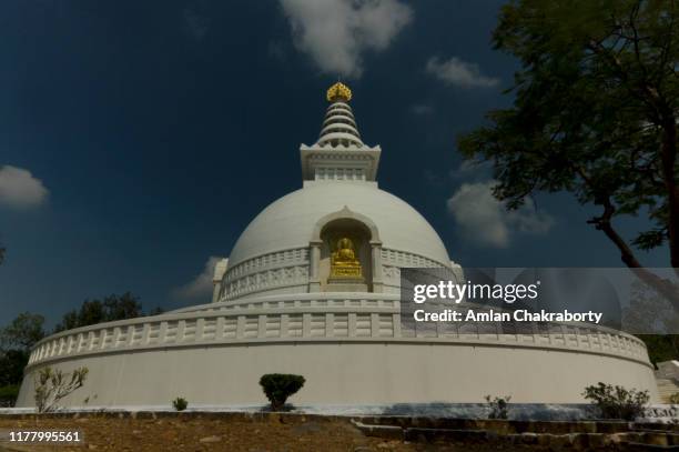 vishwa shanti stupa (world peace stupa) close view in a bright sunny morning - bihar stock pictures, royalty-free photos & images