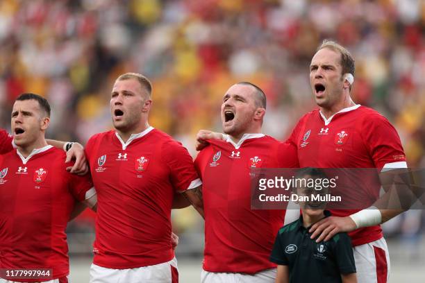 The Wales players line up to sing the national anthem during the Rugby World Cup 2019 Group D game between Australia and Wales at Tokyo Stadium on...