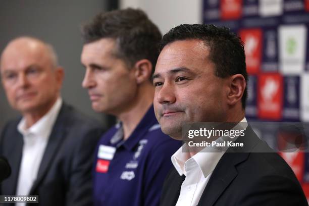 Peter Bell addresses the media together with Justin Longmuir, coach of the Fremantle Dockers and Dale Alcock during a Fremantle Dockers AFL press...