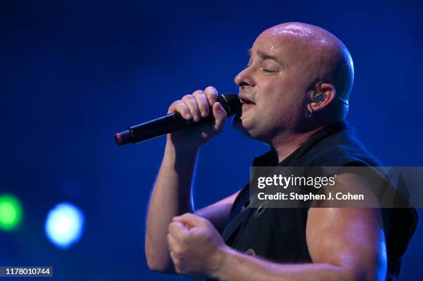 David Draiman of the band Disturbed performs during the 2019 Louder Than Life Music Festival at Highland Festival Grounds at Kentucky Expo Center on...