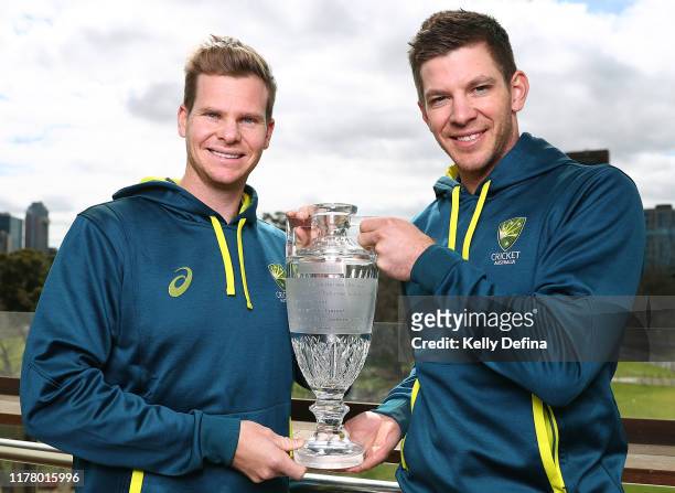 Steve Smith and Tim Paine pose with the Ashes Trophy at Melbourne Cricket Ground on September 30, 2019 in Melbourne, Australia. Australia beat...