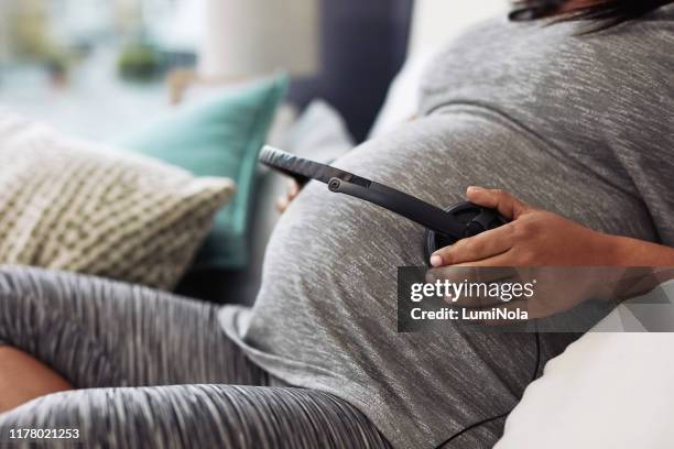 Pregnant Belly Headphones Photos and Premium High Res Pictures - Getty