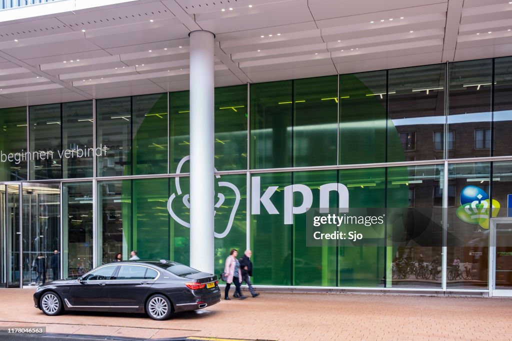 BMW 7-series luxury executive limousine parked in front of the KPN office in Rotterdam