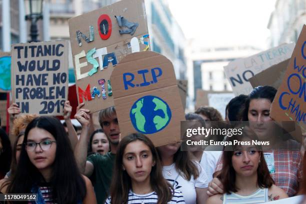 Demonstrators hold banners at the demonstration in Málaga organized by Fridays For Future, Alianza por el Clima, Alianza por la Emergencia Climática...