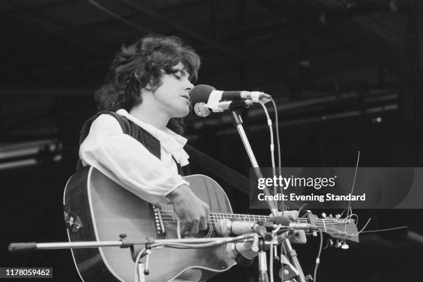 Scottish singer, songwriter and guitarist Donovan performs an acoustic set live on stage at the Isle of Wight Festival 1970 on 30th August 1970.