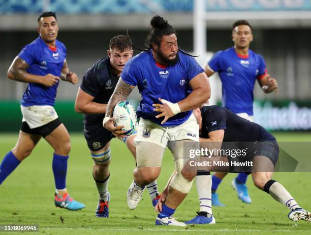 Logovii Mulipola of Samoa breaks through during the Rugby World Cup 2019 Group A game between Scotland and Samoa at Kobe Misaki Stadium on September...