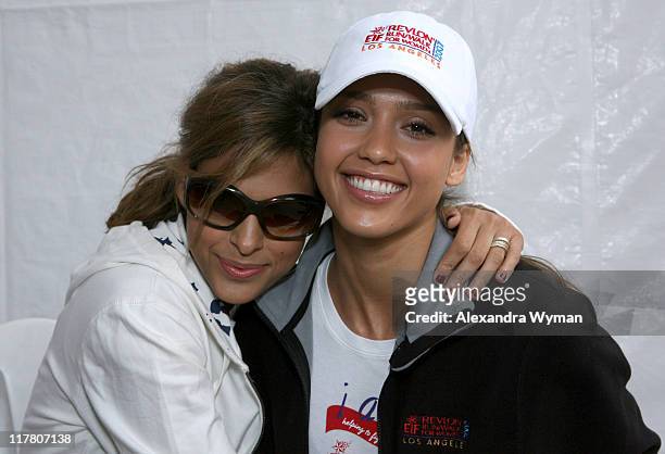 Eva Mendes and Jessica Alba during The Entertainment Industry Foundations 14th Annual Revlon Run/Walk for Women at Los Angeles Memorial Coliseum at...