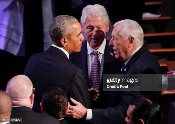 Former U.S. President Barack Obama gathers with former U.S. President Bill Clinton and House Majority Leader Steny Hoyer prior to funeral services...