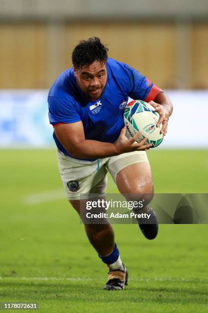 Ray Niuia of Samoa runs with the ball during the Rugby World Cup 2019 Group A game between Scotland and Samoa at Kobe Misaki Stadium on September 30,...