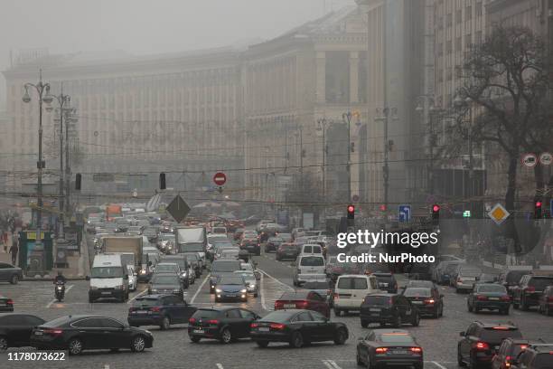 Vehicles are seen at the Khreshchatyk street, downtown Kyiv, Ukraine, October 25, 2019. The city's authorities persuade residents of clean air and...