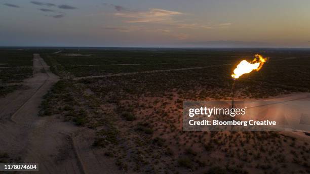 gas flaring in the permian basin - flare stack stock pictures, royalty-free photos & images