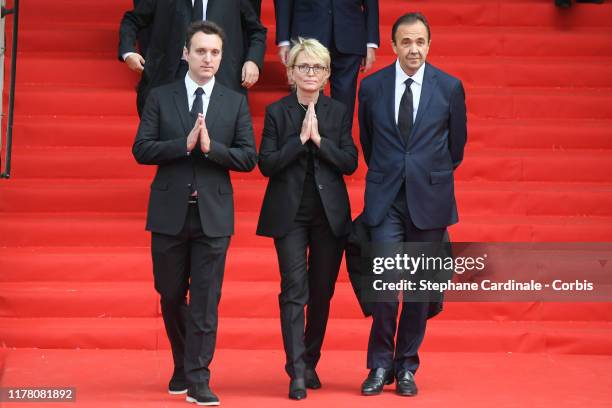 Claude Chirac , the daughter of France's former President Jacques Chirac, leaves the cathedral with her son Martin Rey-Chirac and her husband...