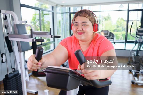 fat woman exercise - fat burning stock pictures, royalty-free photos & images