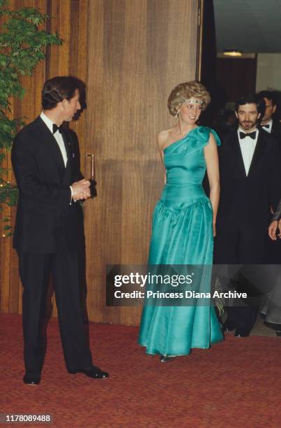 Prince Charles and Diana, Princess of Wales attend the Southern Cross dinner and dance in Melbourne, Australia, October 1985. She is wearing a dress...