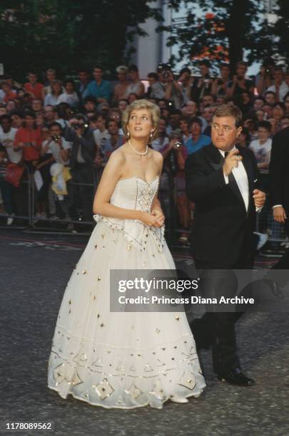 Diana, Princess of Wales attends the premiere of the James Bond film 'The Living Daylights' in London, June 1987. She is wearing an Emanuel dress.