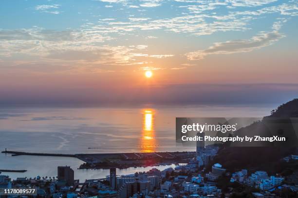 sunrise view of atami shizuoka, japan. - japan sunrise stock-fotos und bilder