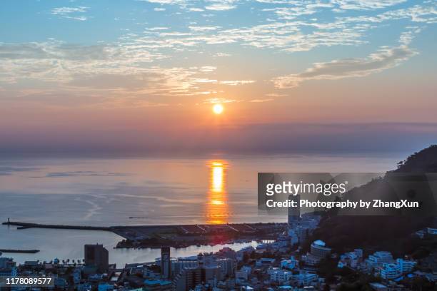 sunrise view of atami shizuoka, japan. - japan sunrise stockfoto's en -beelden
