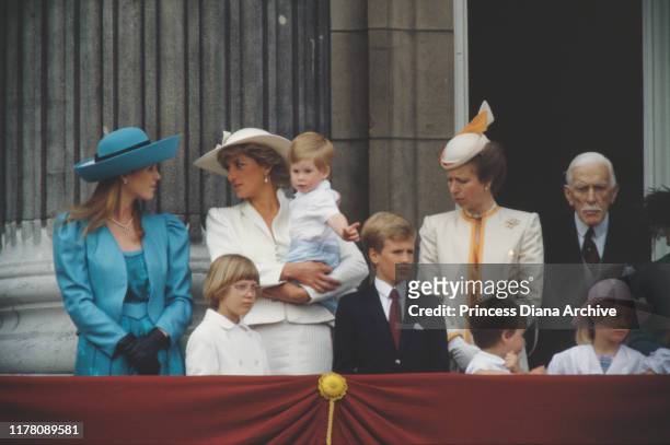 Sarah Duchess of York, Diana, Princess of Wales , Prince Harry and Princess Anne watch the Trooping the Colour ceremony from the balcony of...