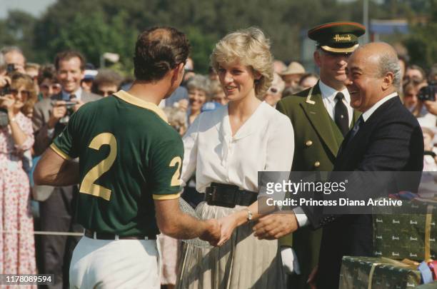 Diana, Princess of Wales with Prince Charles during the Harrods Polo Cup at Smith's Lawn in Windsor, UK, July 1987. She presented some of the prizes...