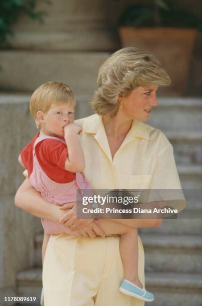 Diana, Princess of Wales with her son Prince Harry during a holiday with the Spanish royal family at the Marivent Palace in Palma de Mallorca, Spain,...