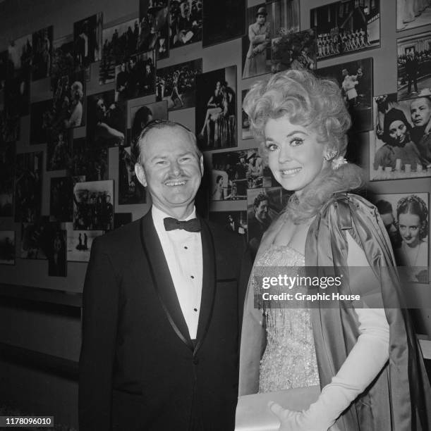 American actress and singer Donna Douglas at the premiere of the film 'The Americanization of Emily', USA, 1964.