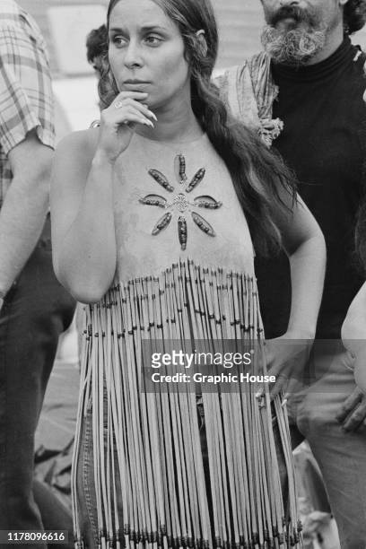 Woman in a beaded and fringed suede vest at the Woodstock music festival in Bethel, New York State, August 1969.