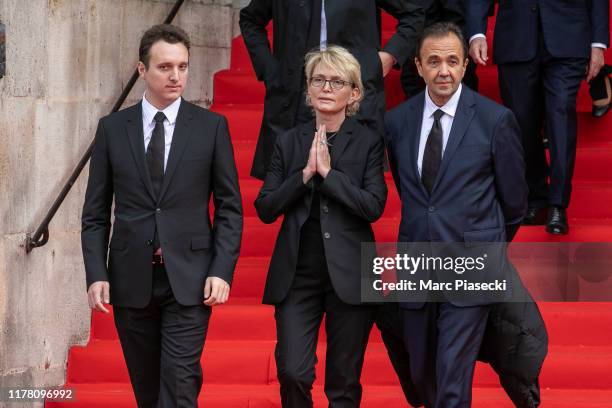 France's former President Jacques Chirac's daughter Claude Chirac , her son Martin Rey-Chirac and husband Frederic Salat-Baroux thank members of the...