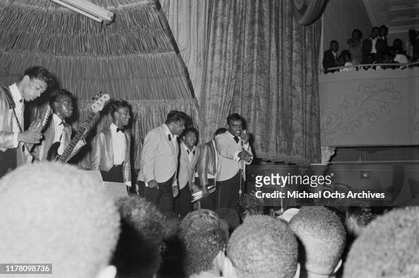 The Isley Brothers perform at a farewell party for R&B disc jockey Nathaniel 'Magnificent' Montague at the Rockland Palace in Harlem, New York City,...