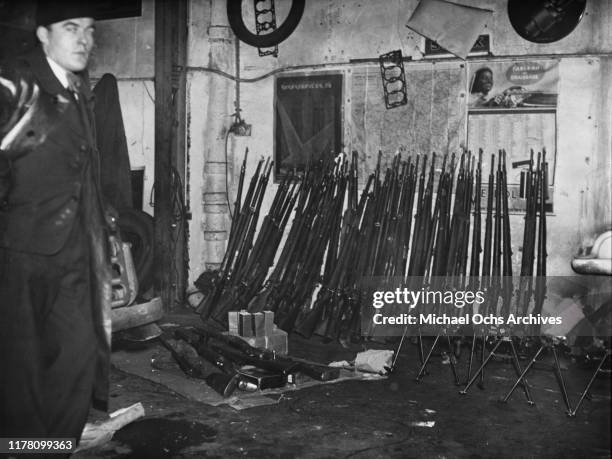 Weapons stashed by the French anti-Communist terrorist group Comité secret d'action révolutionnaire are discovered in a garage at 92 Boulevard de...