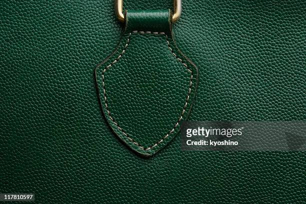close-up di una borsa in pelle verde sfondo texture - materiale di pelle animale foto e immagini stock