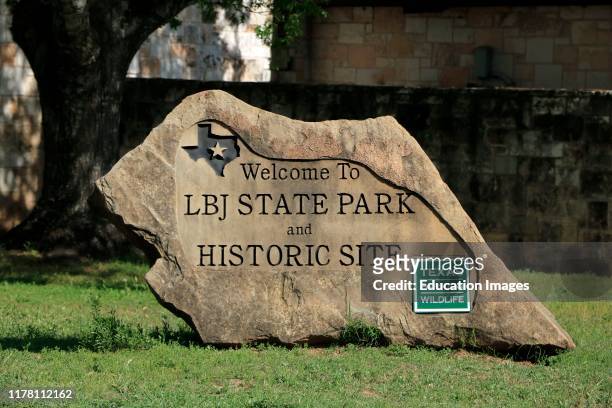 Entrance sign to LBJ State Park and Historical Site near Johnson City Texas.