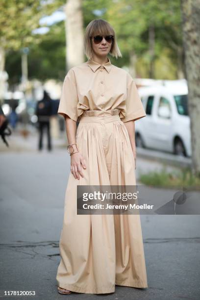 Fashion Week guest on September 28, 2019 in Paris, France.