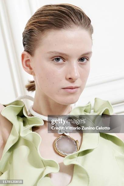 Model poses backstage ahead of the Giambattista Valli Womenswear Spring/Summer 2020 show as part of Paris Fashion Week on September 30, 2019 in...