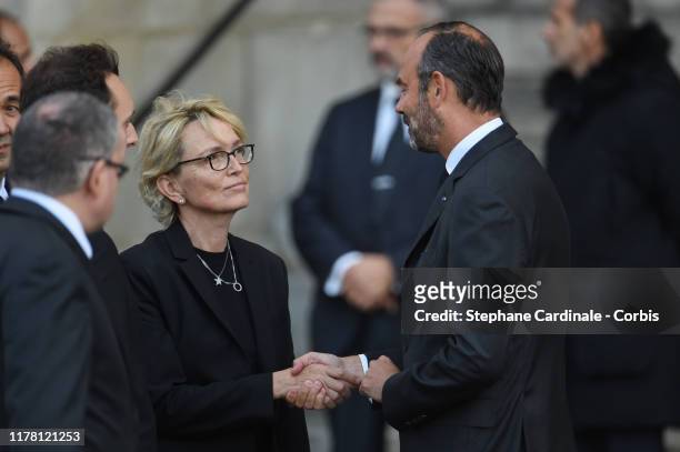 Claude Chirac the daughter of France's former President Jacques Chirac is greeted by France's Prime Minister Edouard Philippe as she arrives to...
