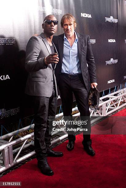 Tyrese Gibson and Michael Bay arrive at the red carpet VIP screening of "Transformers: Dark of the Moon" at Regal South Beach Cinema on June 30, 2011...