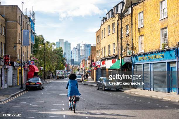 cyclist in hoxton, london - hackney london stock pictures, royalty-free photos & images